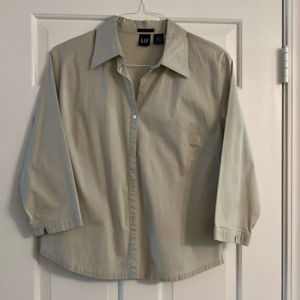 Khaki colored button front collared shirt